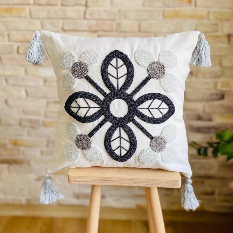 Timeless Collection square embroidered cushion cover in navy and grey petal motif with light grey tassels – 43x43 cm