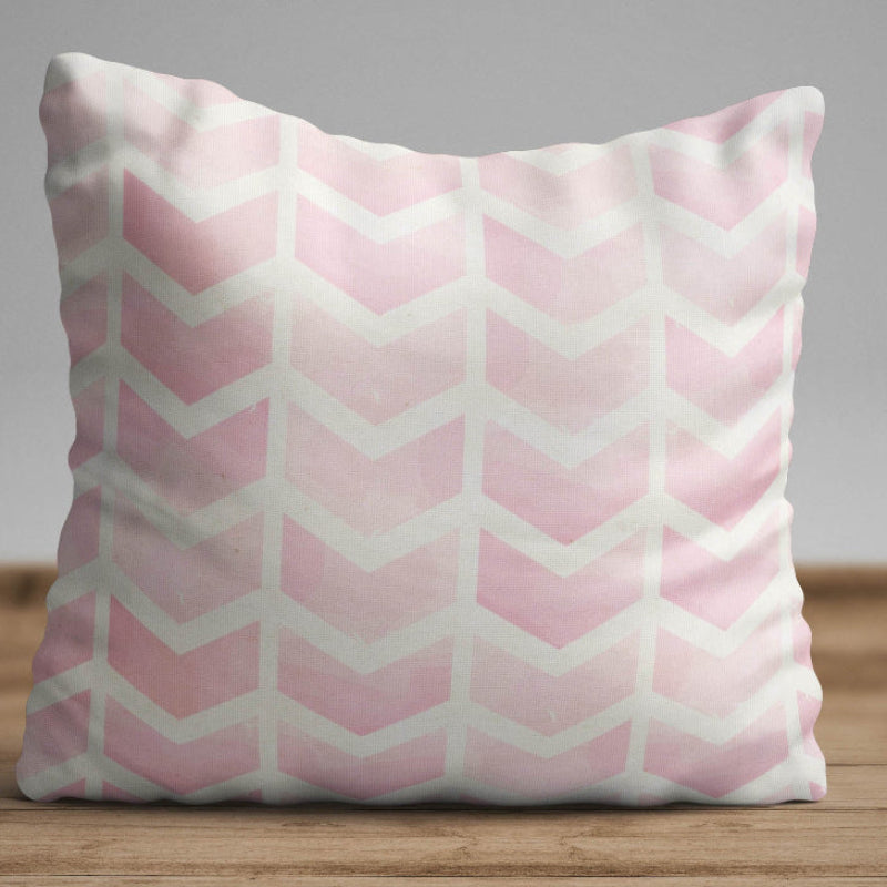 Soft pink geometric chevron cushion cover with minimalist pattern on decorative pillow