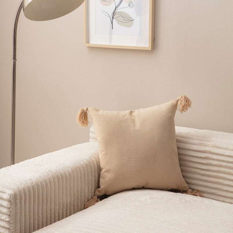 Grey cushion cover with tassels on sofa – 43x43 cm
Decorative grey pillow with tassels styled for modern living room décor
Close-up of grey cushion cover with tassel corners
Neutral tassel cushion for sofa, bed, or lounge space