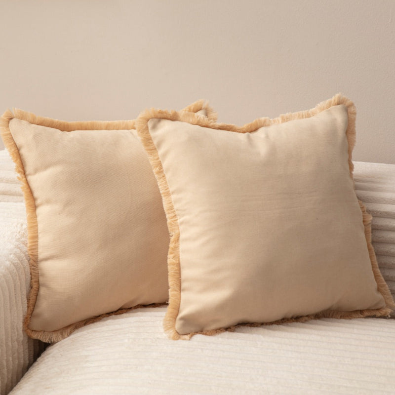 Cream cushion cover with beige fringe on sofa – 43x43 cm
Decorative cream pillow with beige trim styled for modern living room décor
Close-up of cream cushion cover with fringe detail
Neutral cream and beige cushion for sofa or bed décor