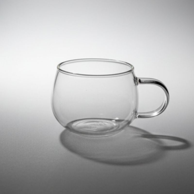 Rounded clear glass mug with handle – bubble design transparent coffee cup”
“Minimalist clear glass tea cup with smooth round shape”
“Modern rounded bubble glass mug for coffee or tea”
“Transparent glass coffee cup with rounded body and handle”
“Contemporary clear glass mug showcasing minimalist drinkware design”