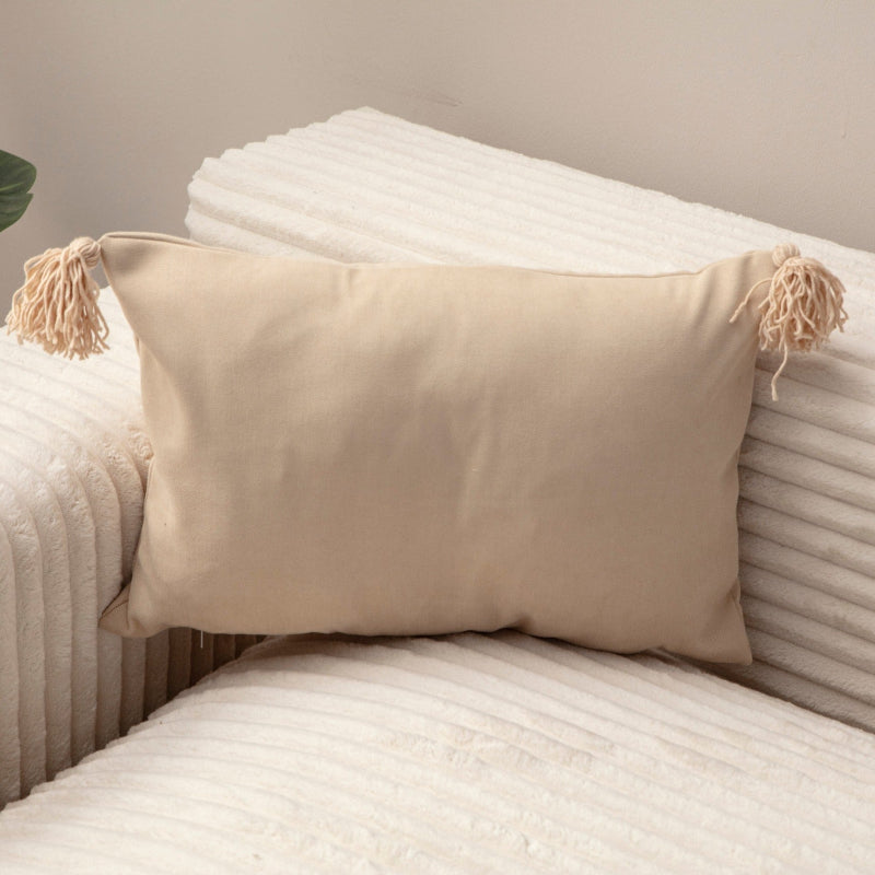 Cream rectangular cushion cover with tassels – 30x50 cm
Decorative cream pillow with tassels styled on beige sofa
Close-up of cream rectangular cushion cover with tassel details
Neutral tassel cushion for modern and boho home décor