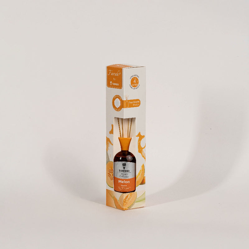 Elegant glass melon reed diffuser with fragrance oil and natural sticks for home fragrance