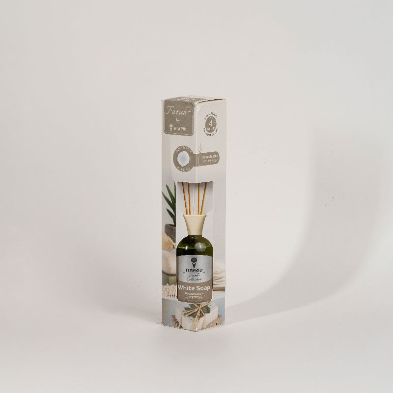 Elegant glass white soap reed diffuser with fragrance oil and natural sticks for home fragrance