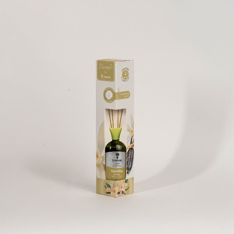 Elegant glass vanilla reed diffuser with fragrance oil and natural sticks for home fragrance