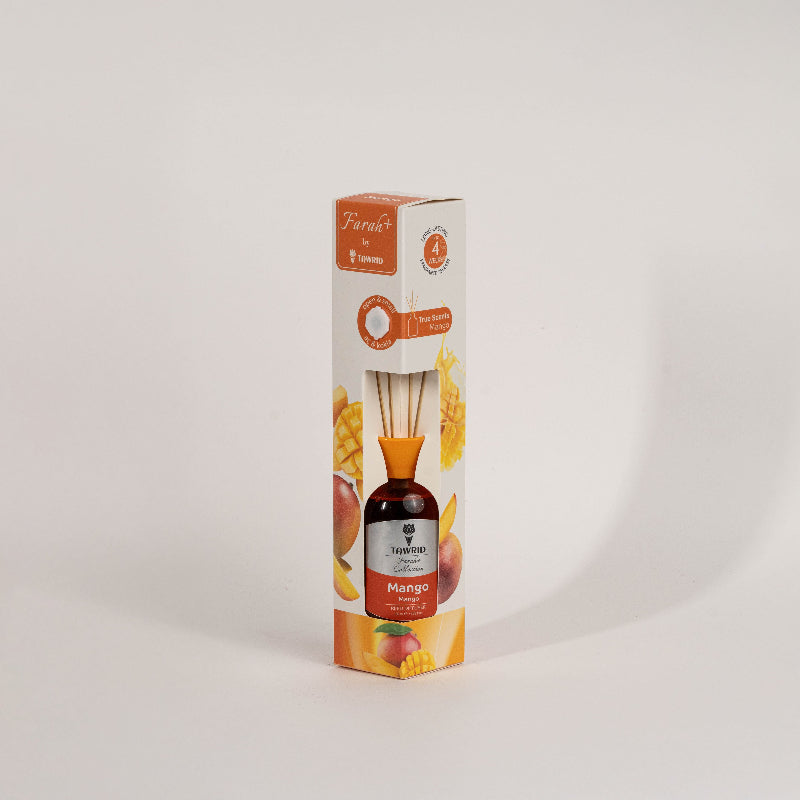 Elegant glass mango reed diffuser with fragrance oil and natural sticks for home fragrance