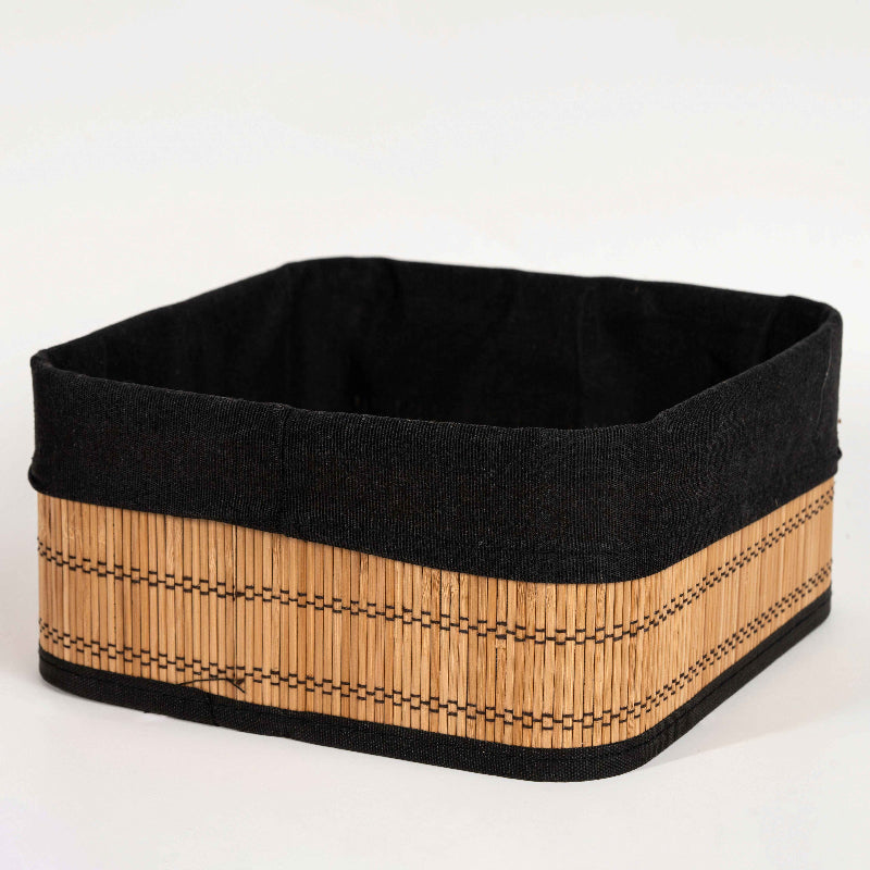 Square bamboo storage basket with black fabric lining