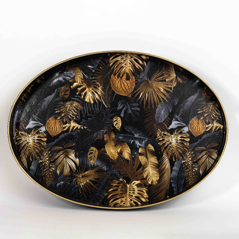 Oval black tray with golden tropical leaves design
Elegant decorative tray with gold and black leaf pattern
Luxury serving tray for coffee table décor
Black and gold oval tray for modern home interiors