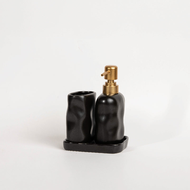 Luxury stone-effect soap dispenser and tumbler set with tray by the poolside