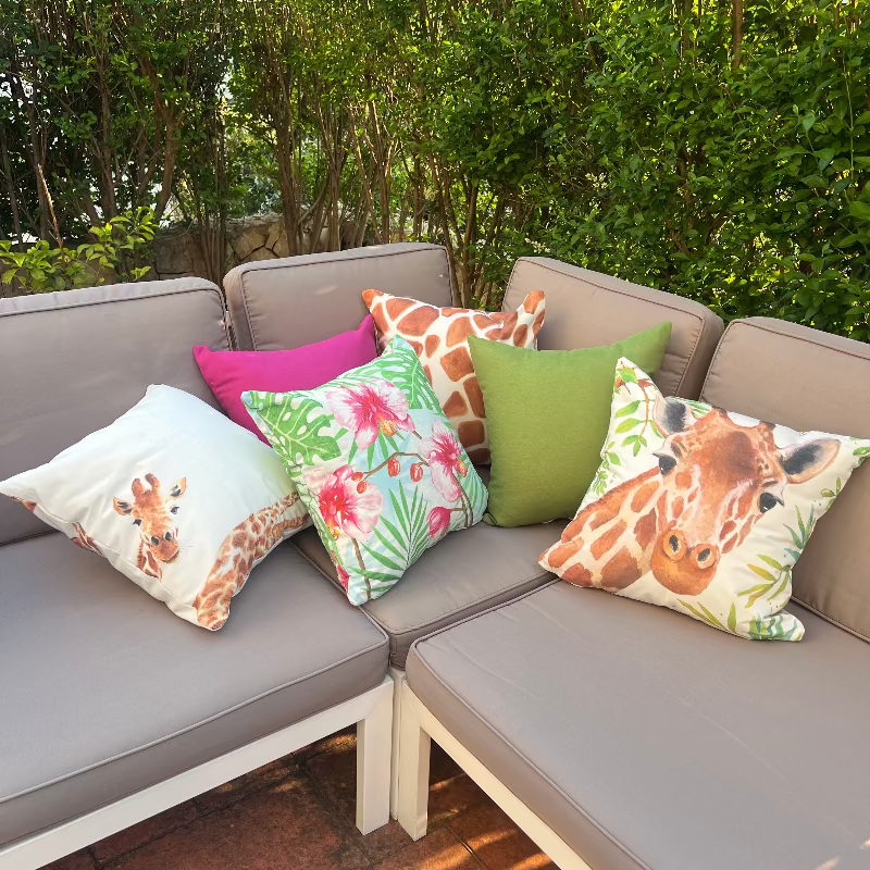 Giraffe print cushion cover with brown watercolor animal pattern on decorative pillow
