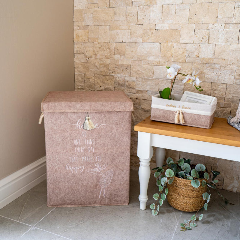 felt laundry basket with lid and tassel
felt storage box with rope handles
Modern laundry hamper with inspirational text design
felt organizer for clothes, toys, or linens