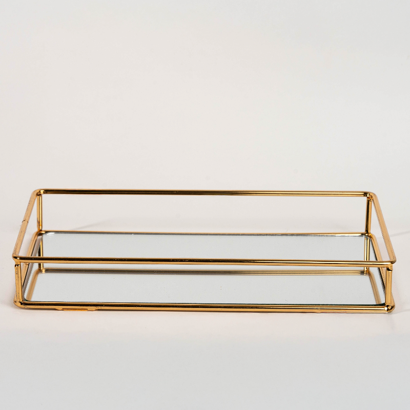 Elegant rectangular gold mirror tray with metal frame for home décor and serving"