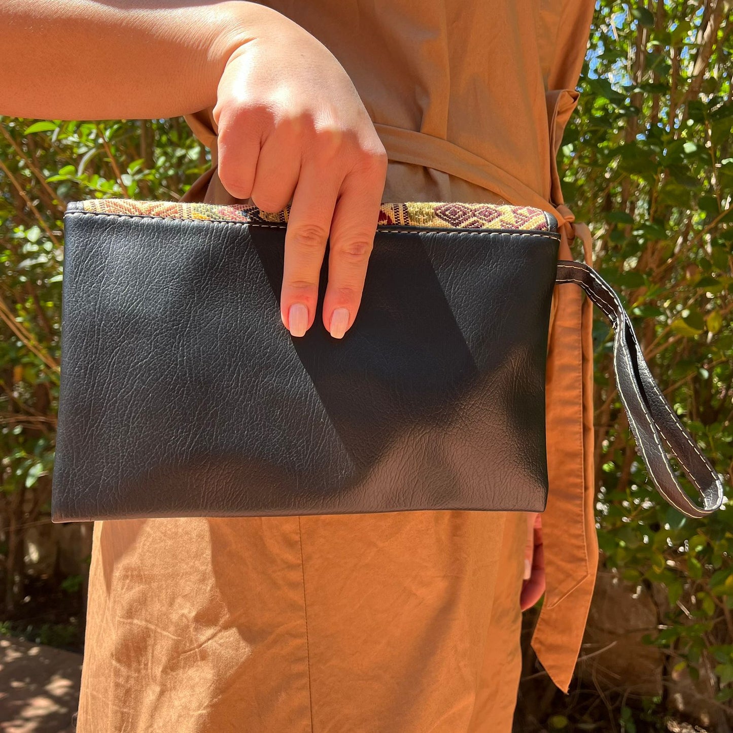 Elegant Black Leather Crossbody Bag with Ethnic Pattern Flap