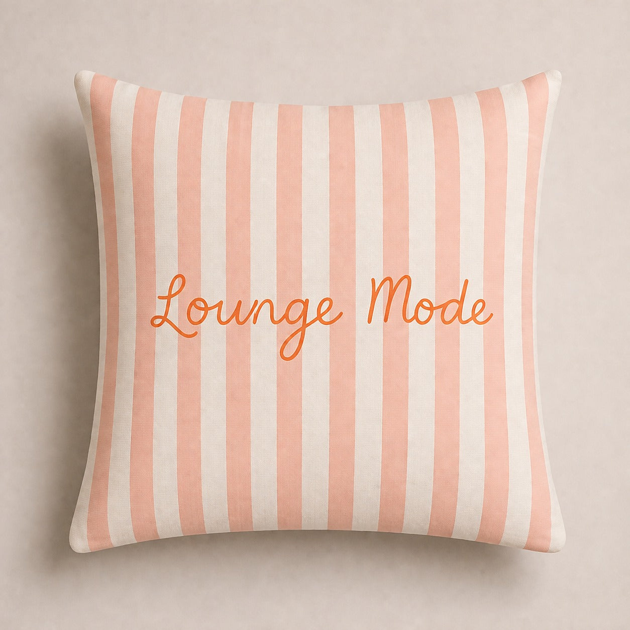 Pink and white striped decorative cushion cover with Lounge Mode text in elegant script lettering