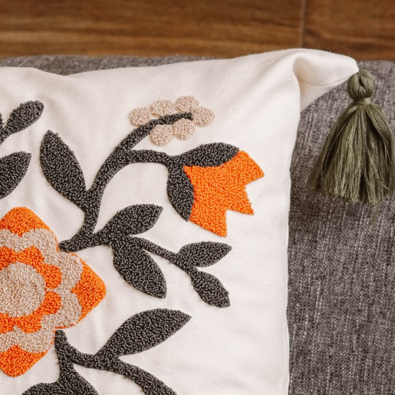Folk Garden Collection folk embroidered floral cushion cover with tassels in black, beige, and orange – 43x43 cm decorative pillow
