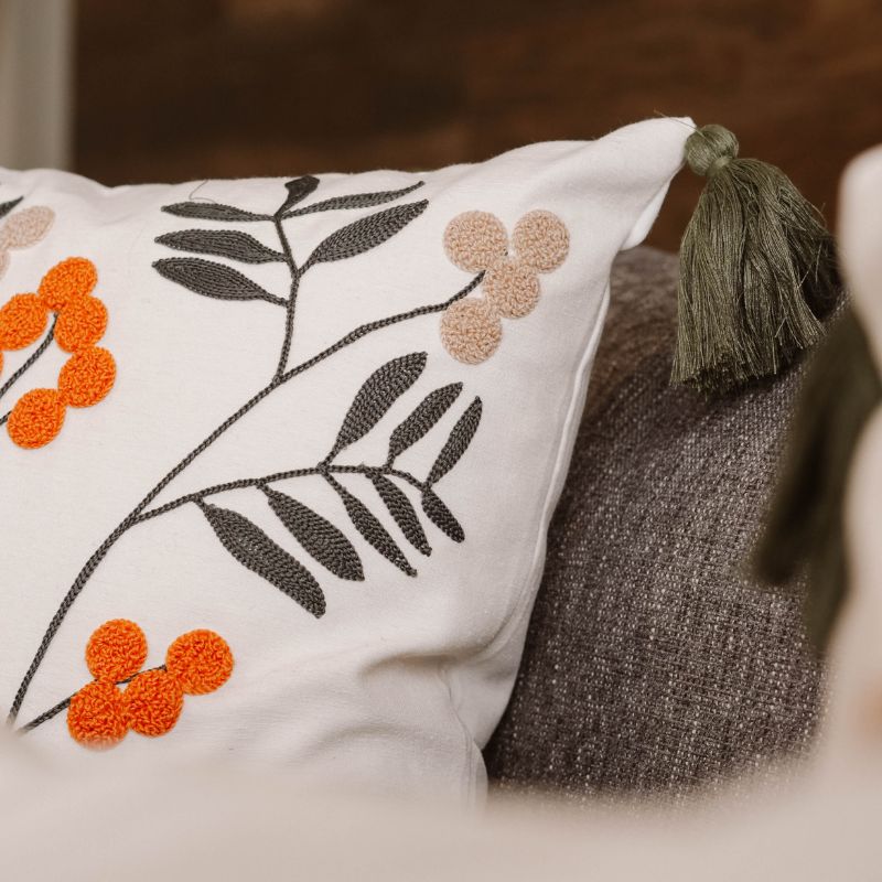 Folk Garden Collection botanical embroidered cushion cover with tassels featuring green leaves and orange-red berries – 43x43 cm decorative pillow