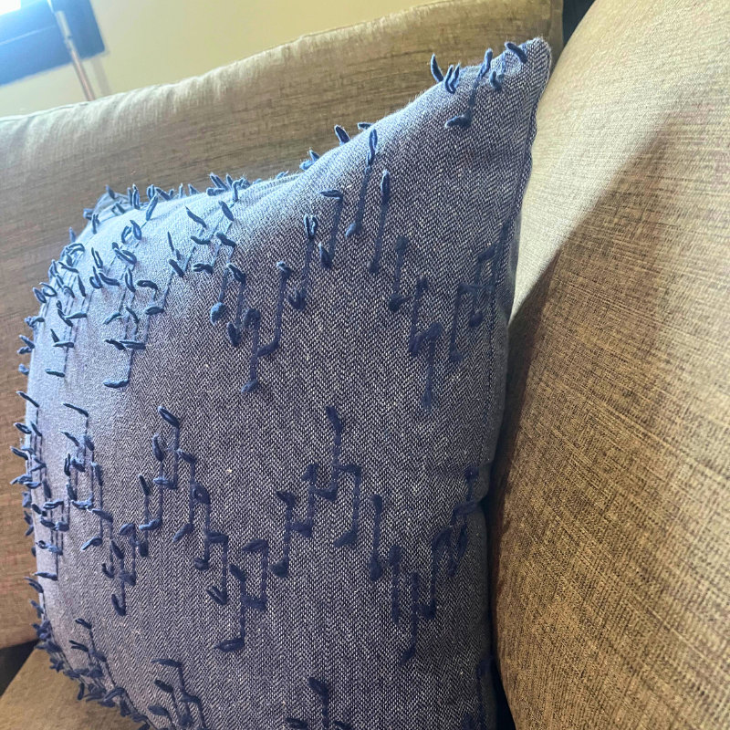 Polka Zigzag Collection – 43x43 cm Jeans Blue a embroidered cushion cover on beige sofa
