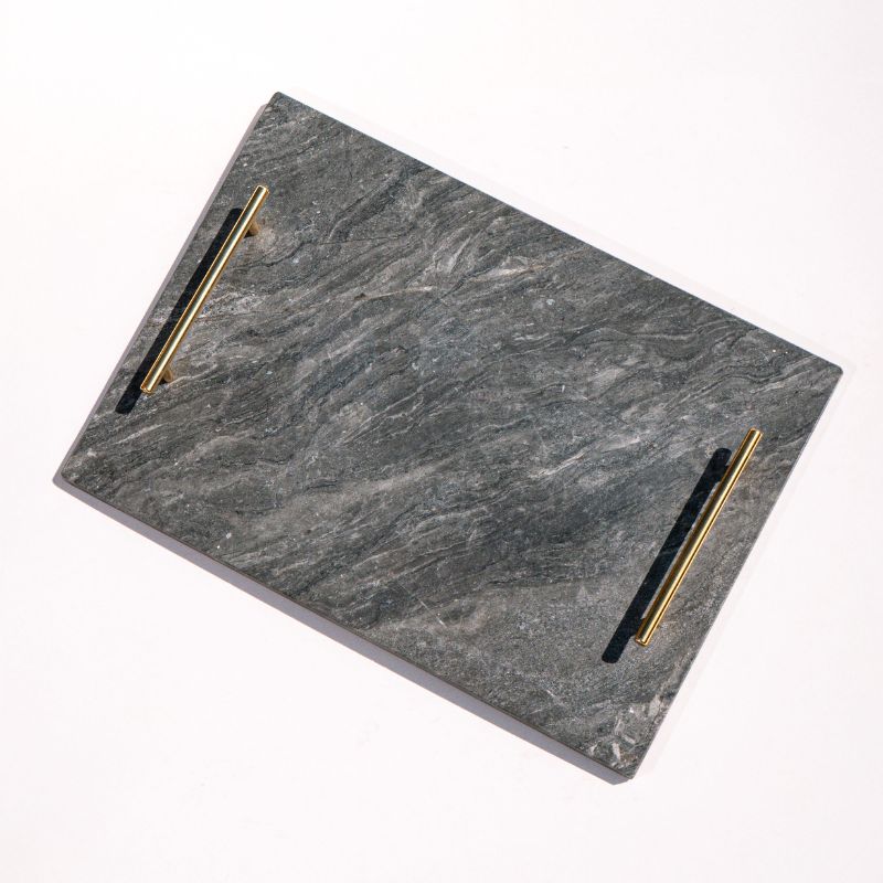 slate marble tray with brass handles placed poolside – luxury stone serving tray