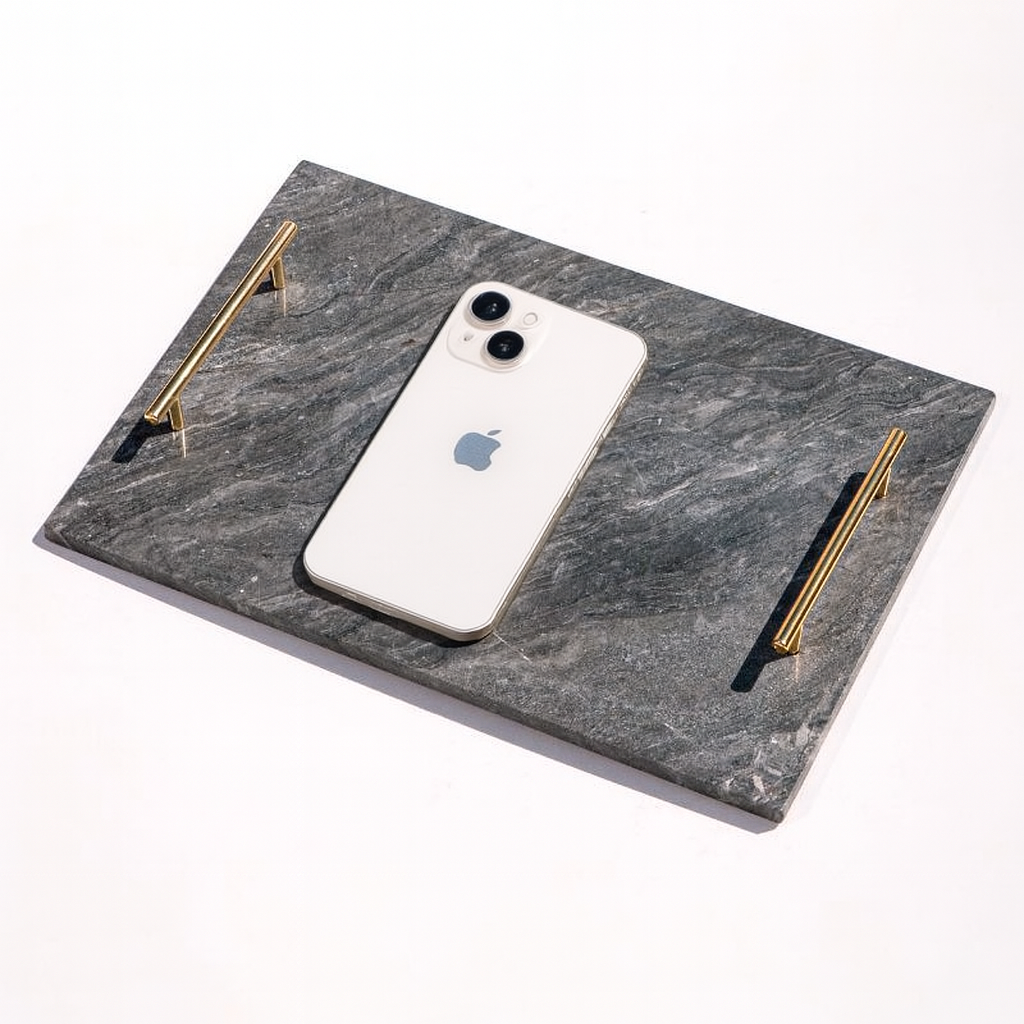 slate marble tray with brass handles placed poolside – luxury stone serving tray