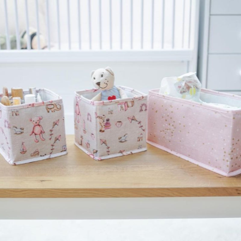 Baby drawer organizer set of 3 with diapers, toys, and bottles
Fabric nursery storage bins in pastel pink with patterns
Drawer organizers for baby clothes, diapers, and essentials
Cute foldable fabric organizers on a wooden table