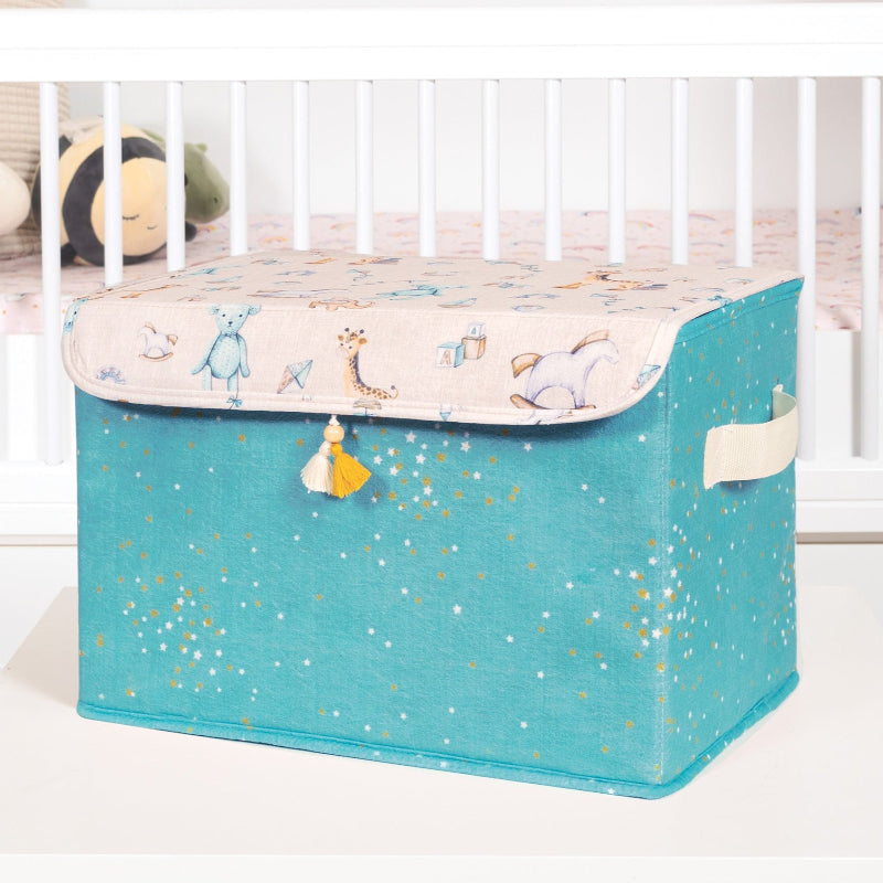 Teal fabric storage box with lid and handles – nursery toy organizer”
“Nursery storage box in teal fabric with golden stars and tassel detail”
“Large teal fabric bin with illustrated lid for toys and baby clothes”
“Decorative teal nursery storage chest with cute baby prints”
“Fabric toy and blanket organizer with lid – teal and gold design”