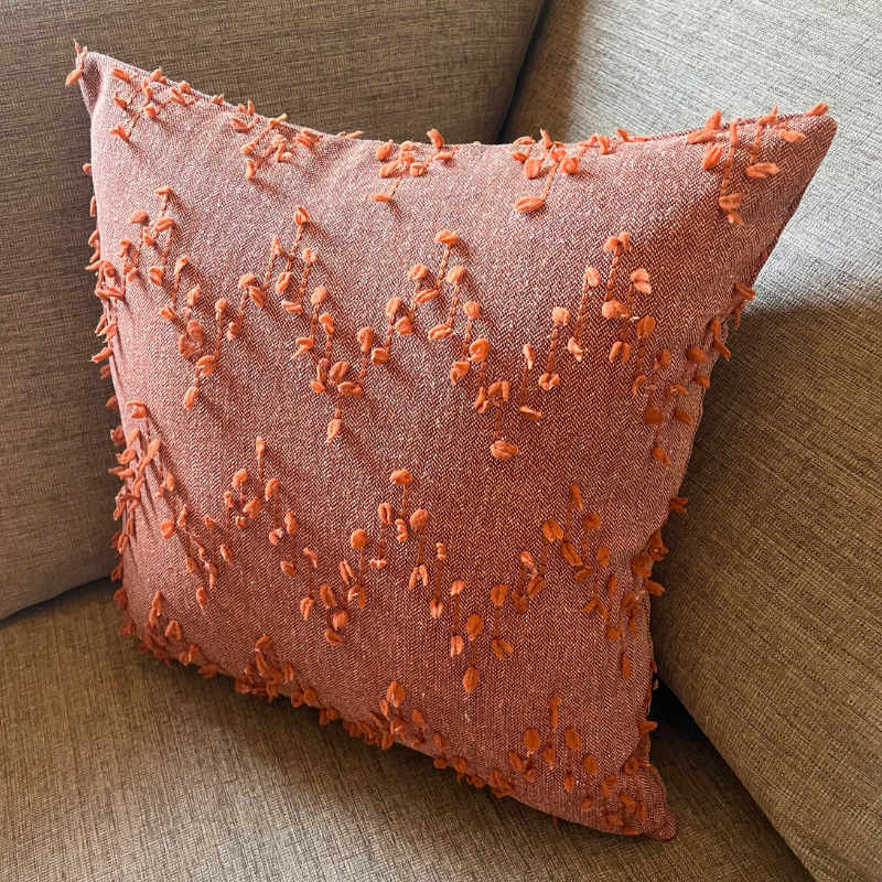 Polka Zigzag Collection – 43x43 cm Warm Terracotta embroidered cushion cover on beige sofa