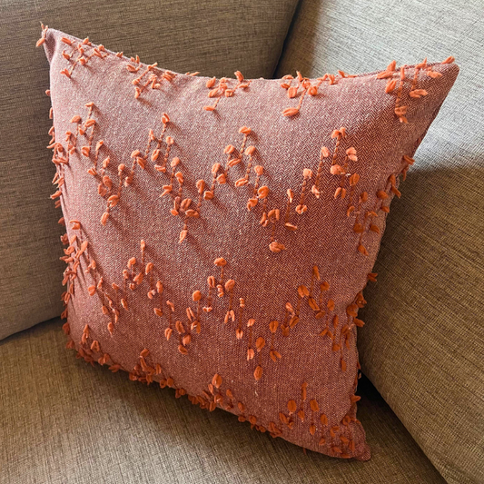 Polka Zigzag Collection – 43x43 cm Warm Terracotta embroidered cushion cover on beige sofa