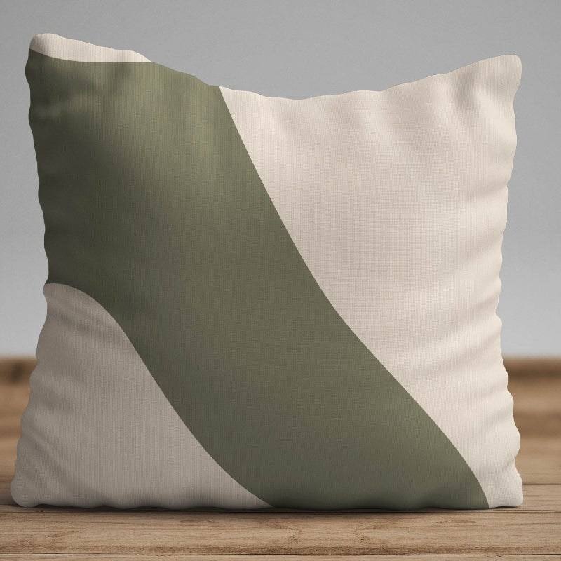 Minimalist cushion cover with olive green abstract geometric shape on a beige background