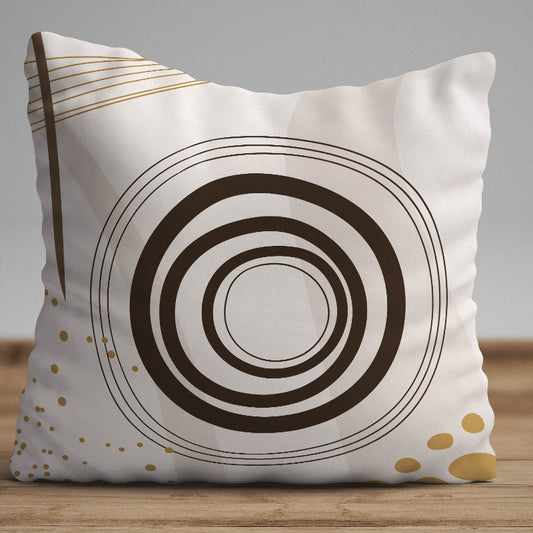 Minimalist cushion cover with concentric circle pattern in brown on beige background with gold accents