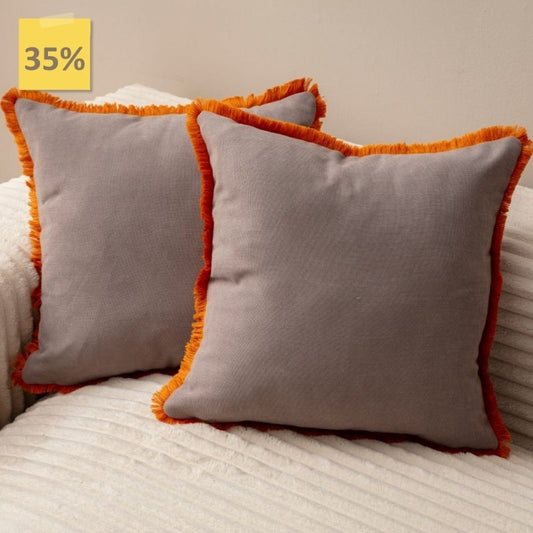 Taupe cushion cover with orange fringe on beige sofa – 43x43 cm
Pair of taupe and orange fringe cushions styled for living room décor
Close-up of taupe cushion with orange trim edges
Decorative pillow in taupe with bold orange fringe