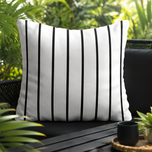 White cushion with thin black vertical stripes in a modern minimalist design