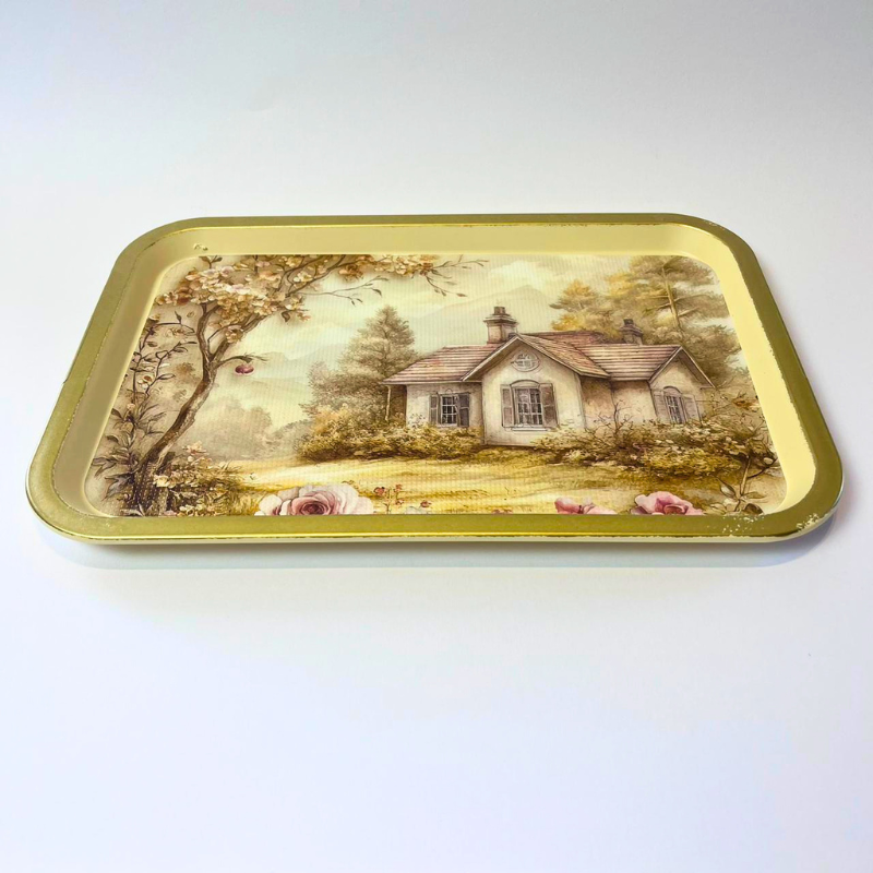 Rectangular serving tray with vintage cottage landscape, floral details, and gold-toned border