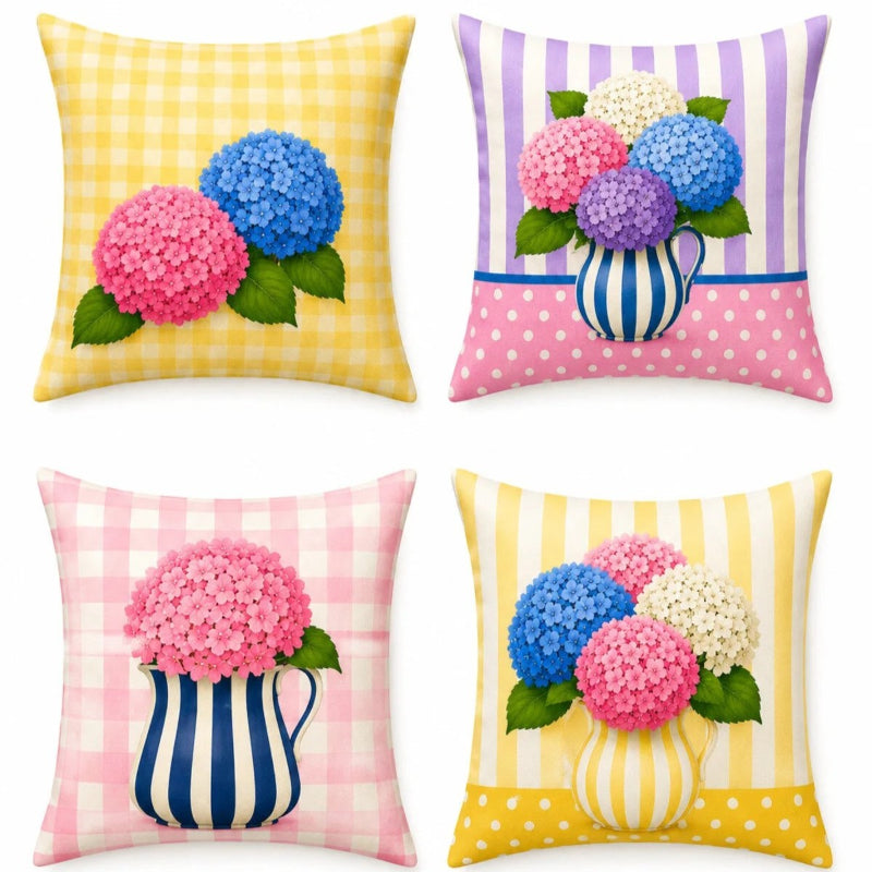 Set of four pastel hydrangea decorative cushion covers featuring floral bouquets, striped ceramic vases, gingham backgrounds, and soft yellow, pink, lavender, and blue accents displayed on a cozy armchair.