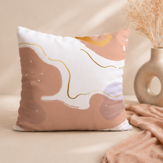 Beige and blush abstract cushion cover with soft flowing organic shapes on a white background