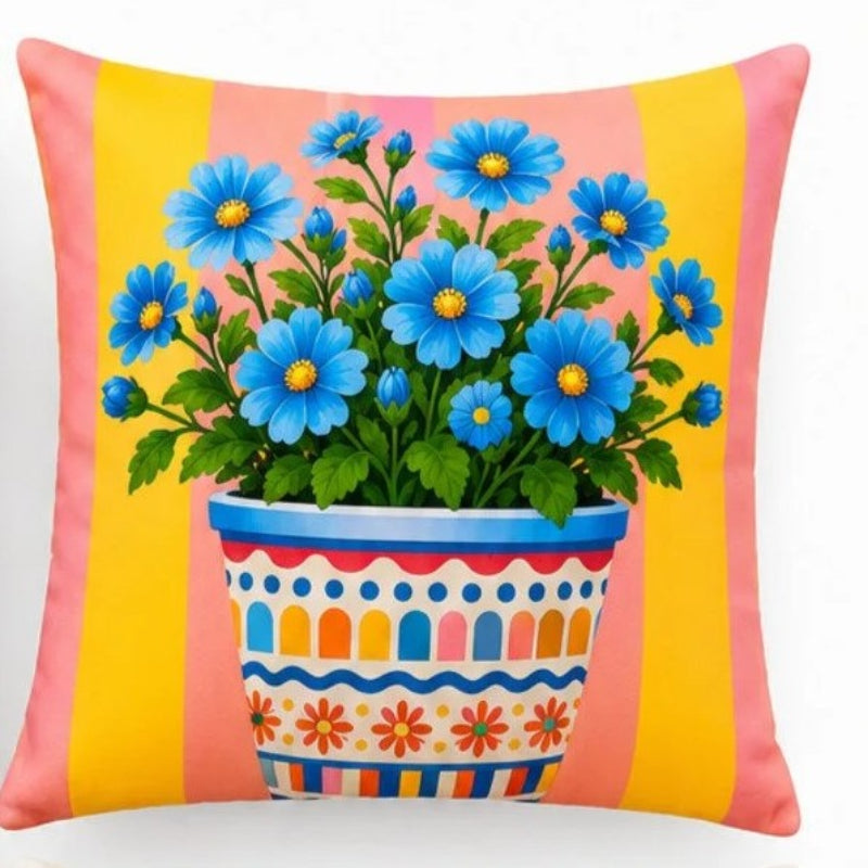 Set of four colorful Mediterranean-inspired decorative cushion covers featuring "La Dolce Vita" typography, floral ceramic planters, striped backgrounds, and a vibrant rainbow wave pattern displayed on a modern cream sofa.