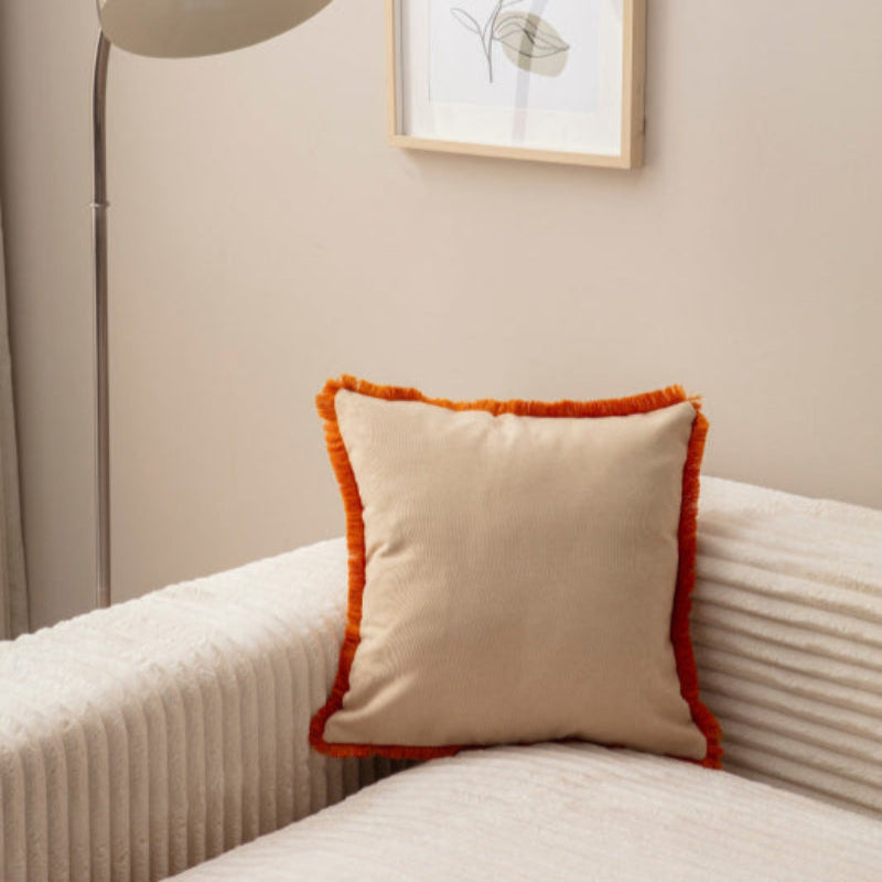 Beige cushion cover with orange fringe on sofa – 43x43 cm
Decorative beige pillow with vibrant orange edges for living room décor
Close-up of beige cushion with orange fringe trim
Modern decorative pillow in beige with bold orange fringe