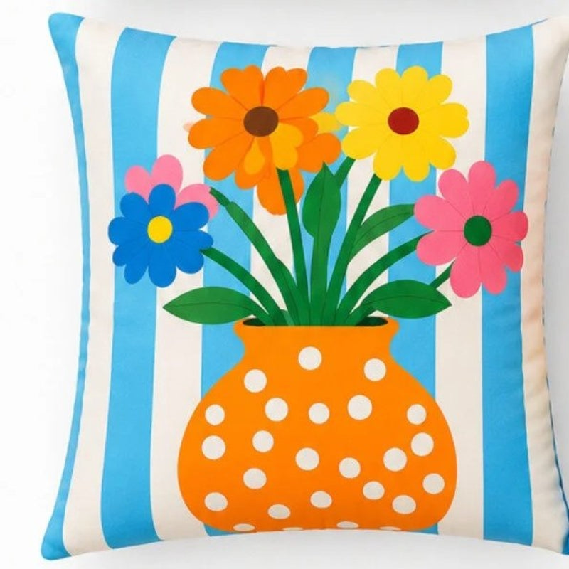 Set of four colorful Mediterranean-inspired decorative cushion covers featuring "La Dolce Vita" typography, floral ceramic planters, striped backgrounds, and a vibrant rainbow wave pattern displayed on a modern cream sofa.