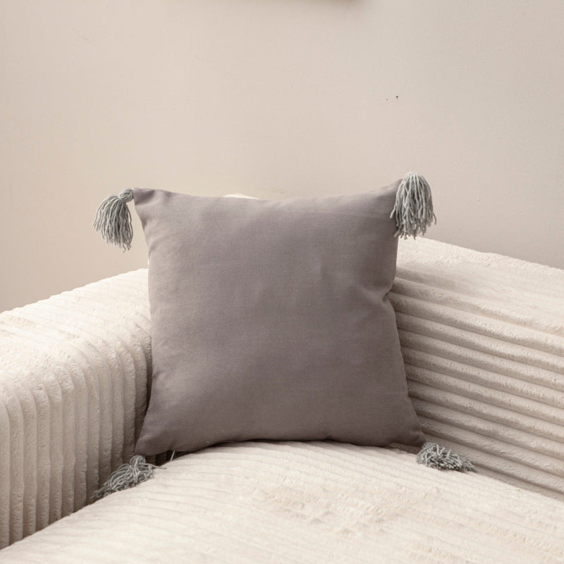 Grey cushion cover with tassels on sofa – 43x43 cm
Decorative grey pillow with tassels styled for modern living room décor
Close-up of grey cushion cover with tassel corners
Neutral tassel cushion for sofa, bed, or lounge space