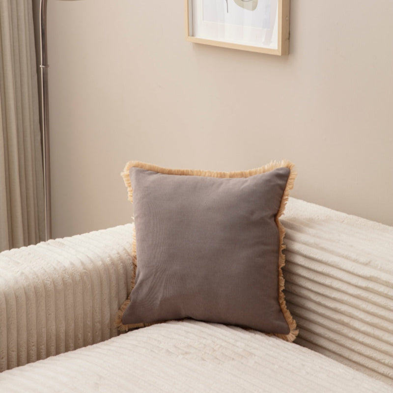 Taupe cushion cover with beige fringe on sofa – 43x43 cm
Pair of taupe pillows with beige fringe trim for living room décor
Close-up of taupe cushion with soft fringe edging
Decorative pillow in taupe and beige styled on a beige sofa