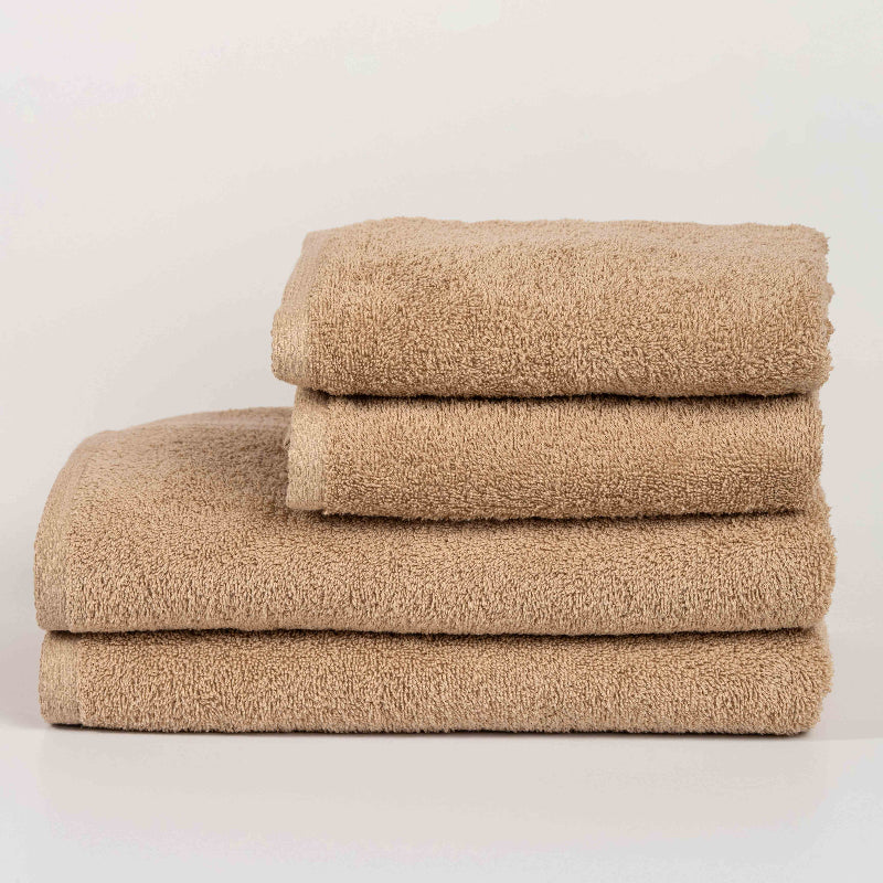 Absorbent sandstone cotton towel folded neatly.
