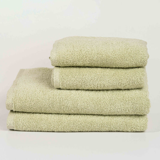 Absorbent aqua green cotton towel folded neatly.