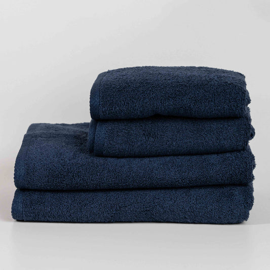 Absorbent midnight blue cotton towel folded neatly.
