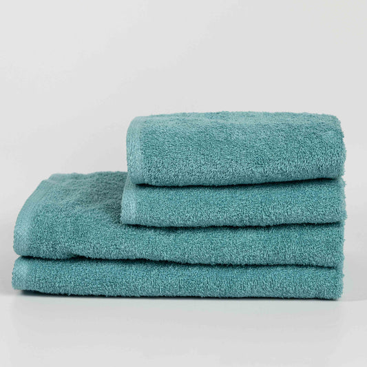 Absorbent pastel green cotton towel folded neatly.