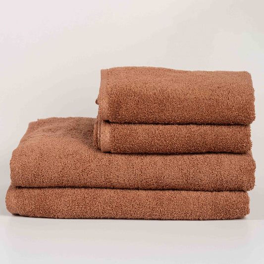 Absorbent mocca cotton towel folded neatly.