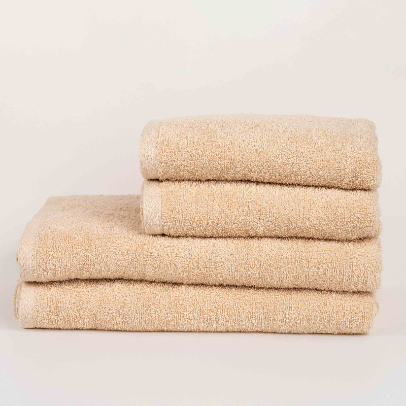 Absorbent terracotta brown cotton towel folded neatly.