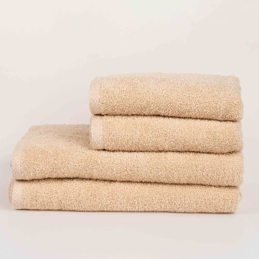Absorbent terracotta brown cotton towel folded neatly.