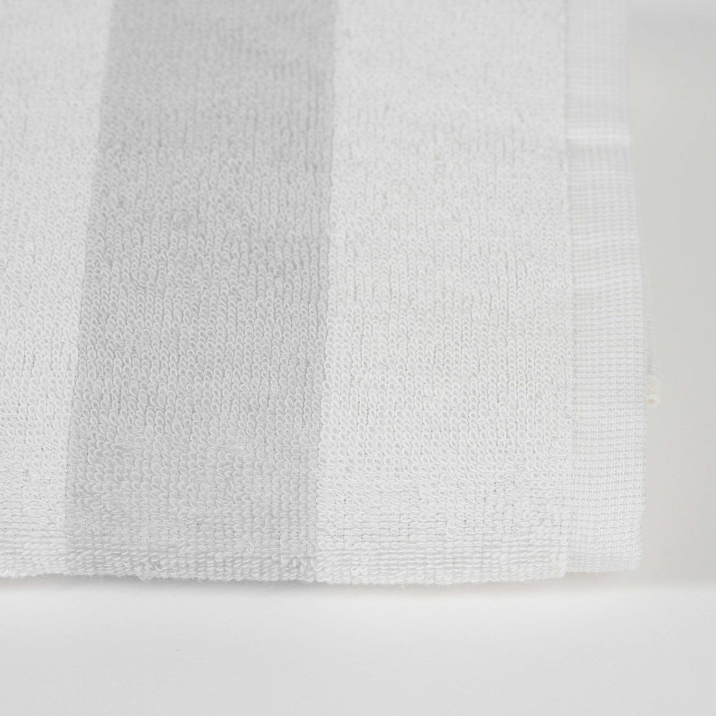 Grey cotton bathrobe with Ocean Row white and grey striped towel, plus free grey anti-slip mat gift – Mix and Match bathroom essentials from KeyHomeLB.