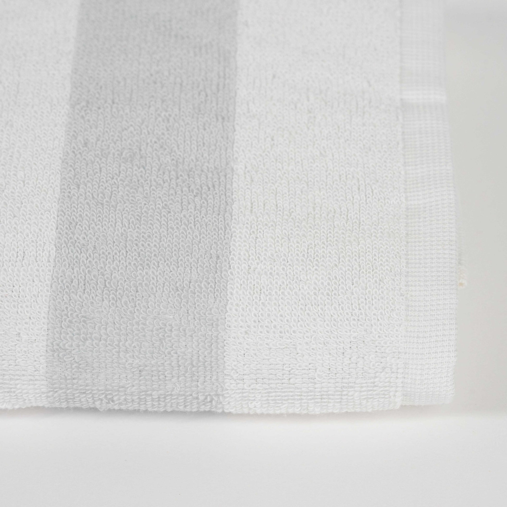 Grey cotton bathrobe with Ocean Row white and grey striped towel, plus free grey anti-slip mat gift – Mix and Match bathroom essentials from KeyHomeLB.
