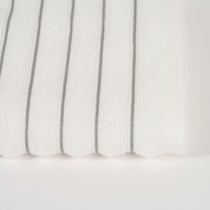 Green: "Luxury green cotton towel set with striped border – absorbent bathroom towels"

Yellow: "Luxury yellow cotton towel set – striped absorbent cotton towels"

Charcoal Grey: "Charcoal grey cotton towel set – soft absorbent striped towels for bathroom"

Beige: "Beige cotton towel set with striped border – hotel quality bathroom towels"

Coraille: "Coraille cotton towel set – soft absorbent striped cotton towels"

White: "White cotton towel set with golden stripe – luxury absorbent bathroom towels