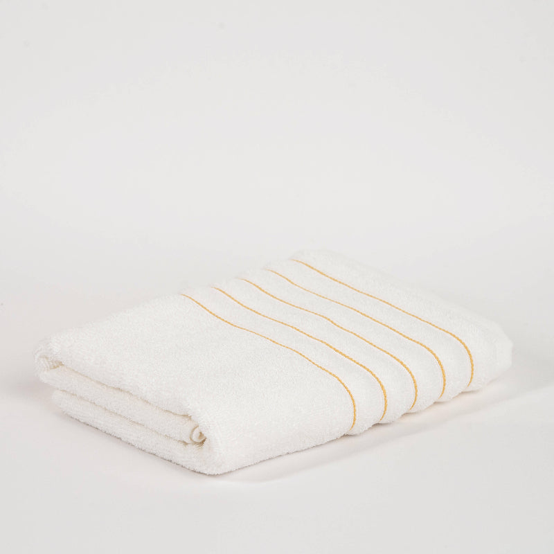 Green: "Luxury green cotton towel set with striped border – absorbent bathroom towels"

Yellow: "Luxury yellow cotton towel set – striped absorbent cotton towels"

Charcoal Grey: "Charcoal grey cotton towel set – soft absorbent striped towels for bathroom"

Beige: "Beige cotton towel set with striped border – hotel quality bathroom towels"

Coraille: "Coraille cotton towel set – soft absorbent striped cotton towels"

White: "White cotton towel set with golden stripe – luxury absorbent bathroom towels